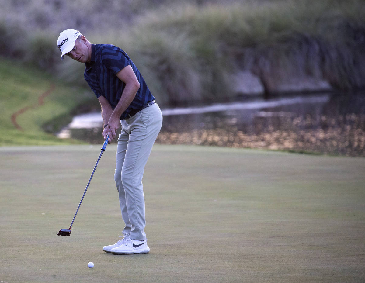 Martin Laird makes the winning putt on the 17th hole during a playoff in the final round of the ...