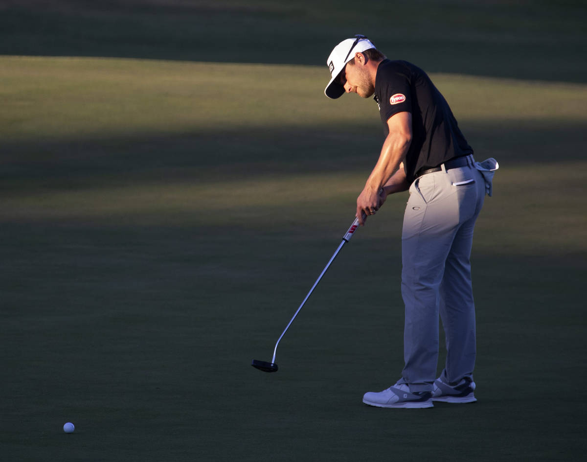 Austin Cook putts on the eighteenth hole during a playoff in the final round of the 2020 Shrine ...