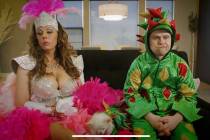 Showgirl Jade Simone and Piff the Magic Dragon is shown in a screen-grab in a promotional video ...