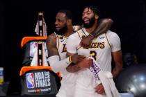 Los Angeles Lakers' LeBron James (23) and Anthony Davis (3) celebrate after the Lakers defeated ...