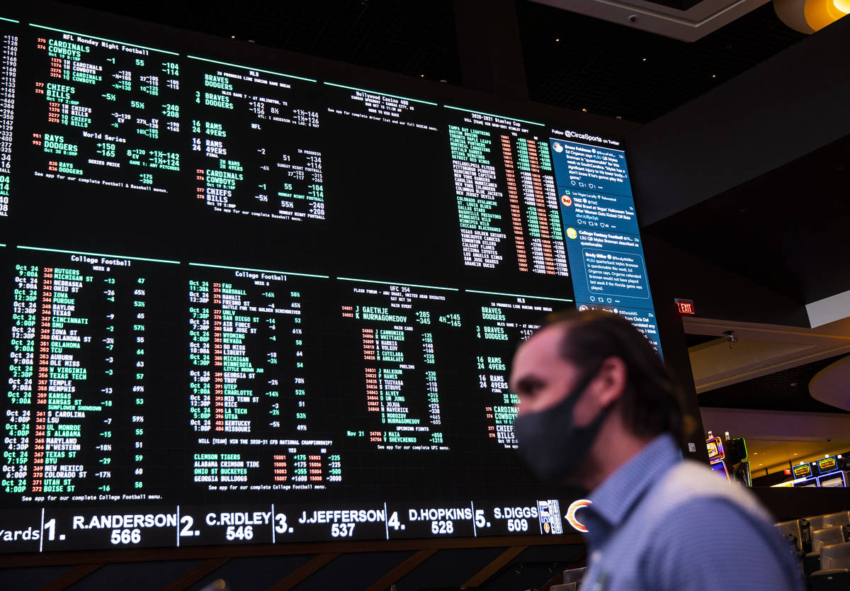 Matt Metcalf, director of the Circa Sportsbook, talks about sports betting during a tour of Cir ...