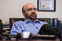 Lawyer Alex Ghibaudo pauses during an interview in his Las Vegas office on Feb. 18, 2015. (Revi ...