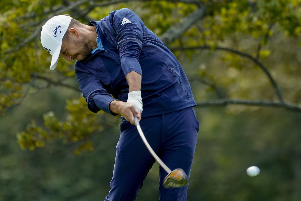 Xander Schauffele, of the United States, plays his shot from the second tee during the final ro ...