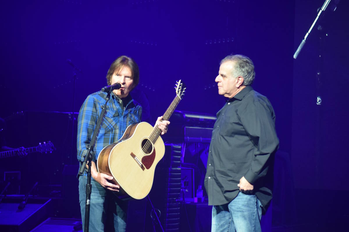 Rock great John Fogerty presents a new Gibson guitar to Las Vegas Veterans Crisis Intervention ...