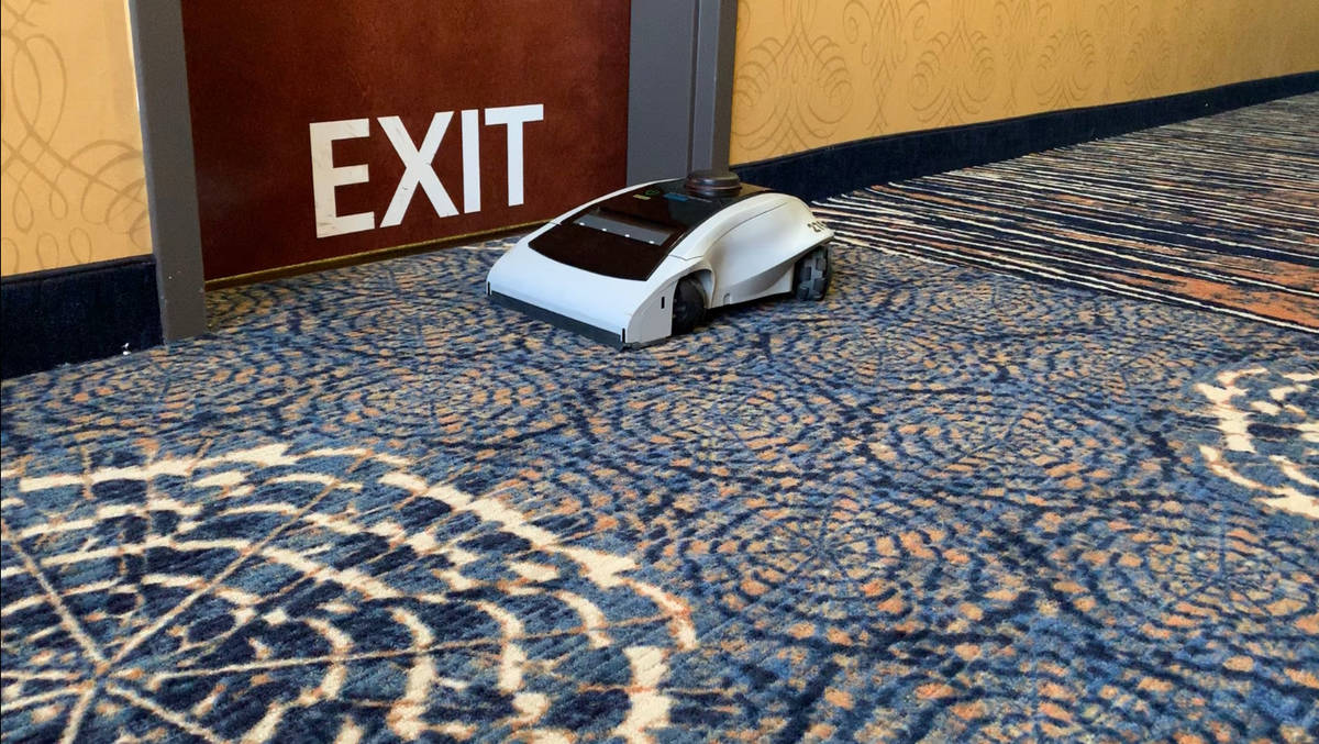 A later version of Maidbot's cleaning robot Rosie cleaning a suite at the Marina Bay Sands in S ...