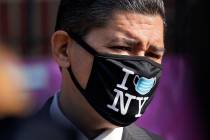 New York City Schools Chancellor Richard Carranza wears a mask during a news conference at the ...