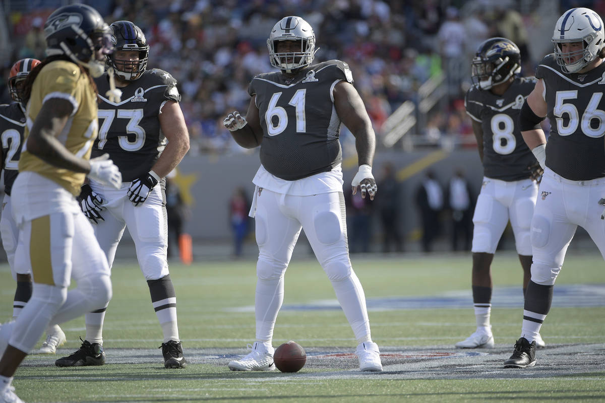 AFC center Rodney Hudson (61), of the Oakland Raiders, sets up for a play during the first half ...