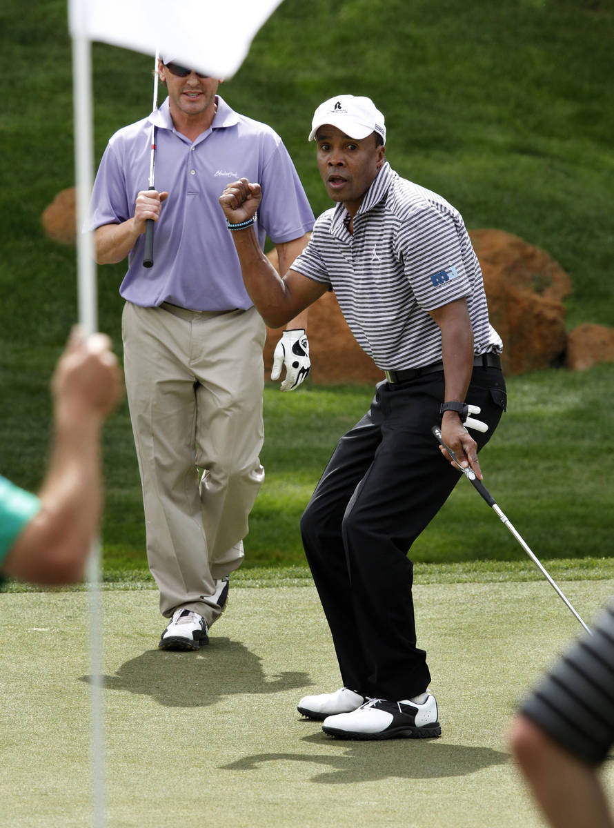 In this March 29, 2012, file photo, Sugar Ray Leonard reacts after nearly missing a put on the ...