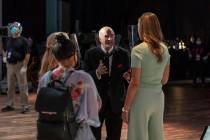 Shark Kevin O'Leary talks with members of the "Shark Tank" production, all of whom are wearing ...