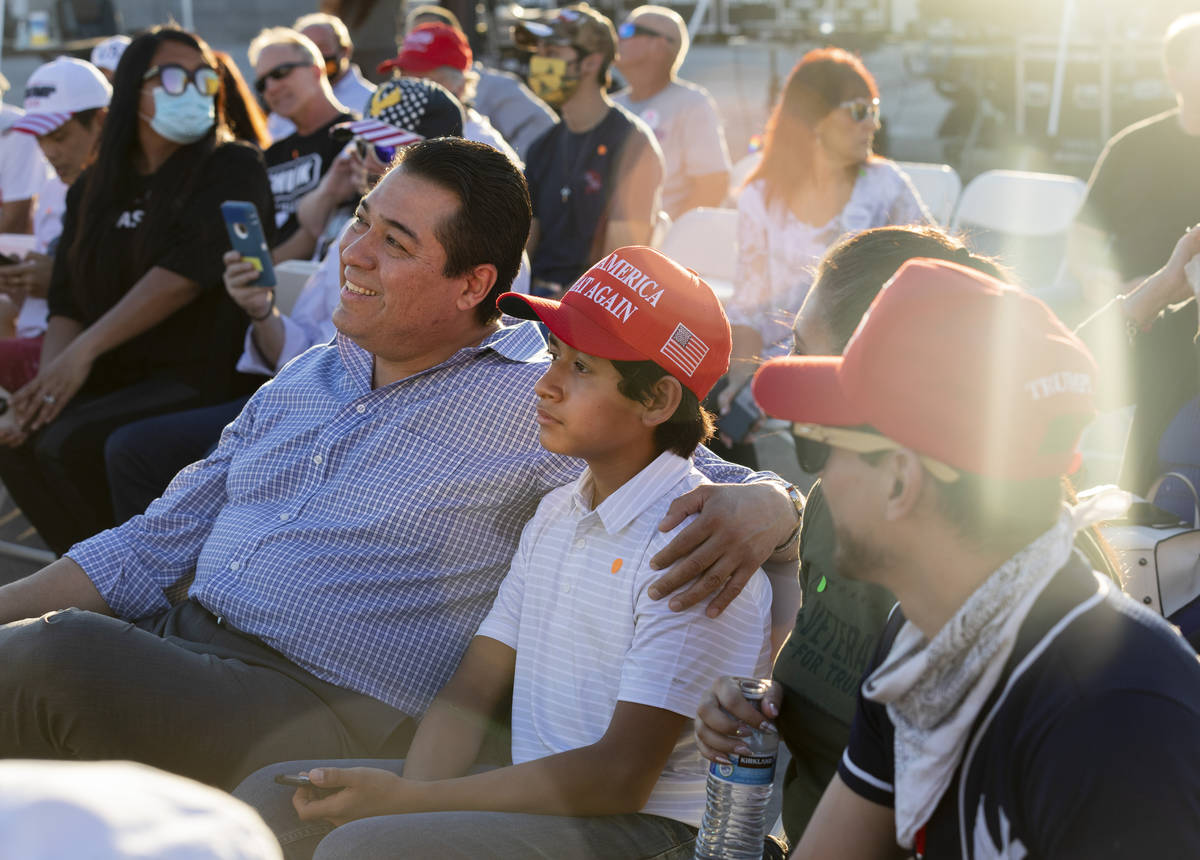 Jesus Marquez, 45, center left, and his son Jesus Marquez Jr.,12, of Las Vegas Donald Trump Jr. ...