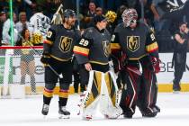 Golden Knights goaltenders Marc-Andre Fleury (29) and Robin Lehner (90) talk alongside Chandler ...