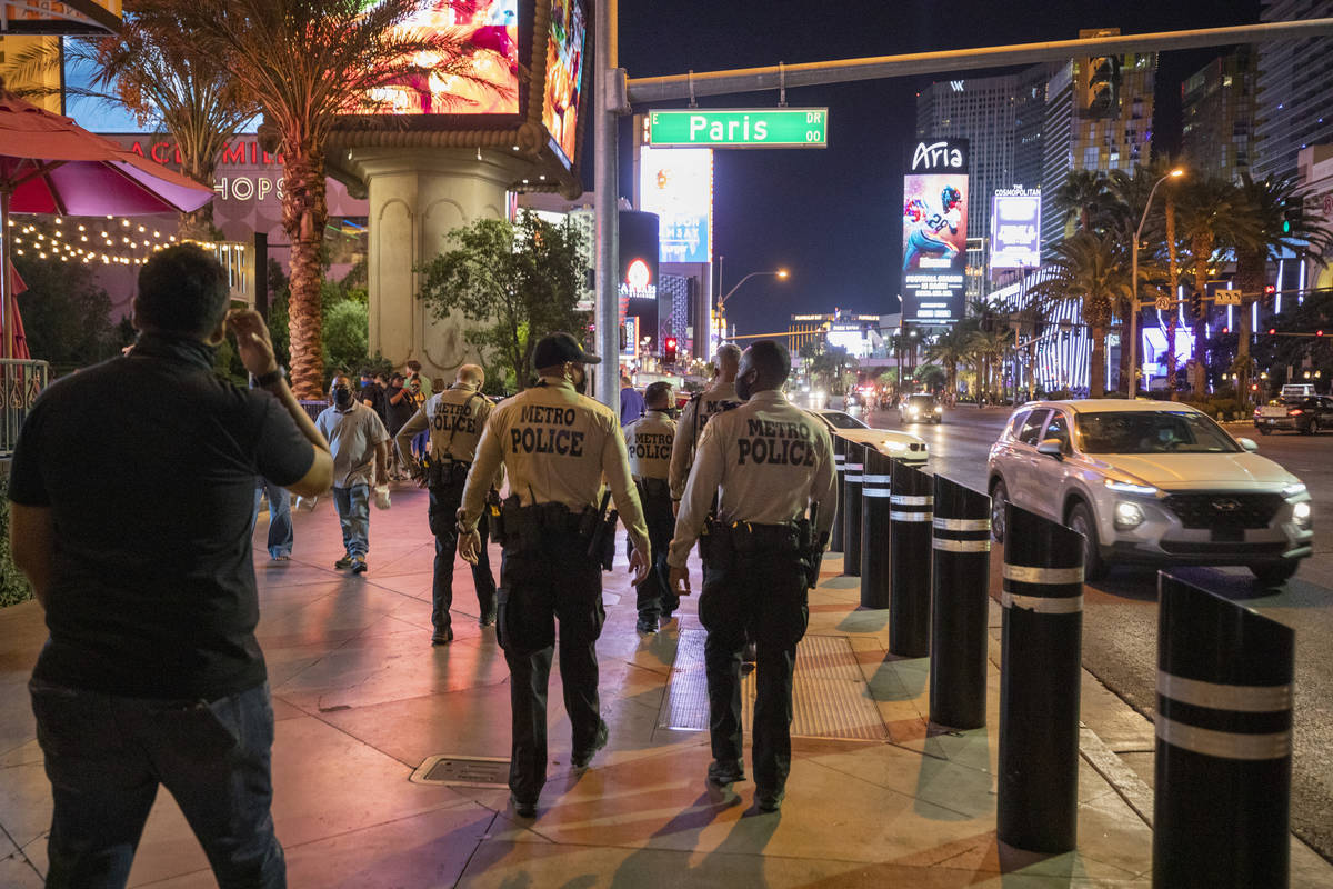 Las Vegas Metro Police are seen patrolling the Las Vegas Strip, on Thursday, Oct. 15, 2020. (El ...