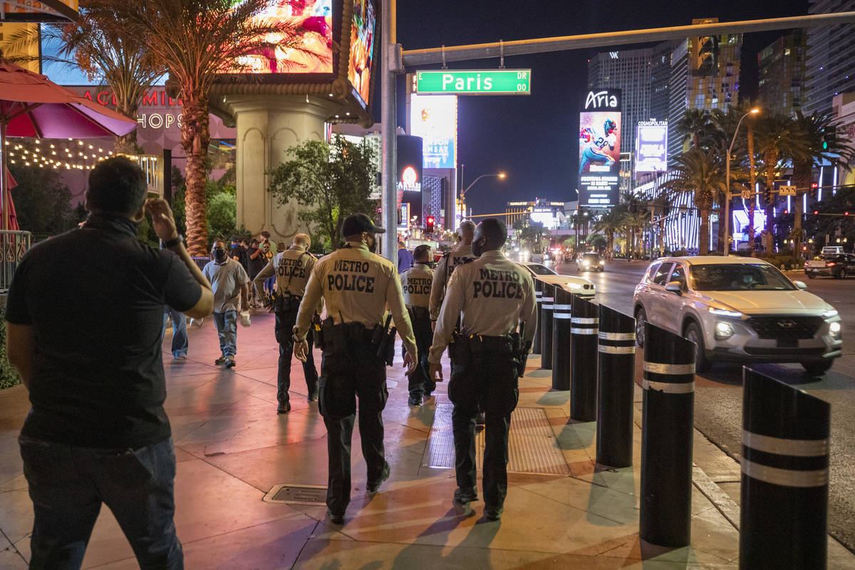 Las Vegas Metro Police are seen patrolling the Las Vegas Strip, on Thursday, Oct. 15, 2020. (El ...