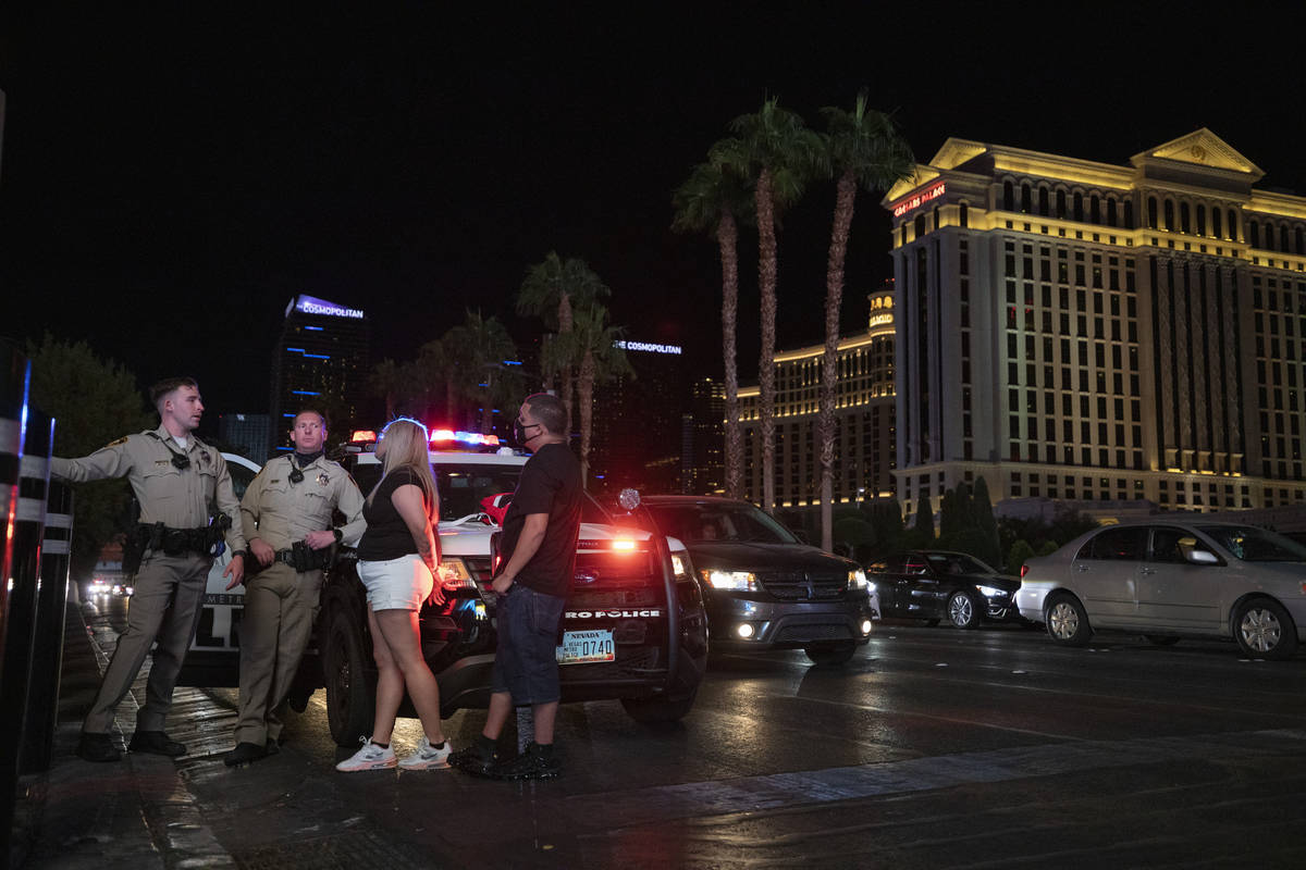 Las Vegas Metro Police are seen patrolling the Las Vegas Strip, on Thursday, Oct. 15, 2020. (El ...