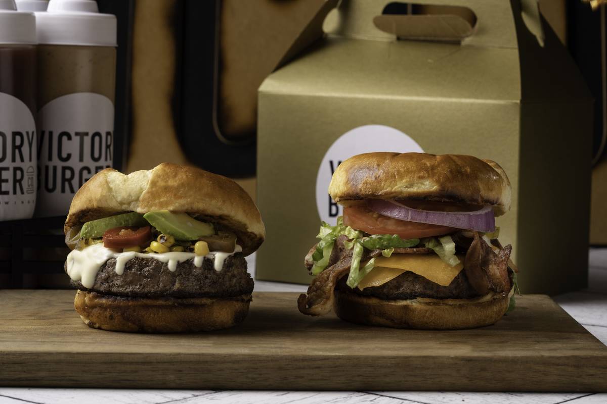 Victory Burger's Victory Loco Burger, left, and Victory Burger. (Mark Mediana)