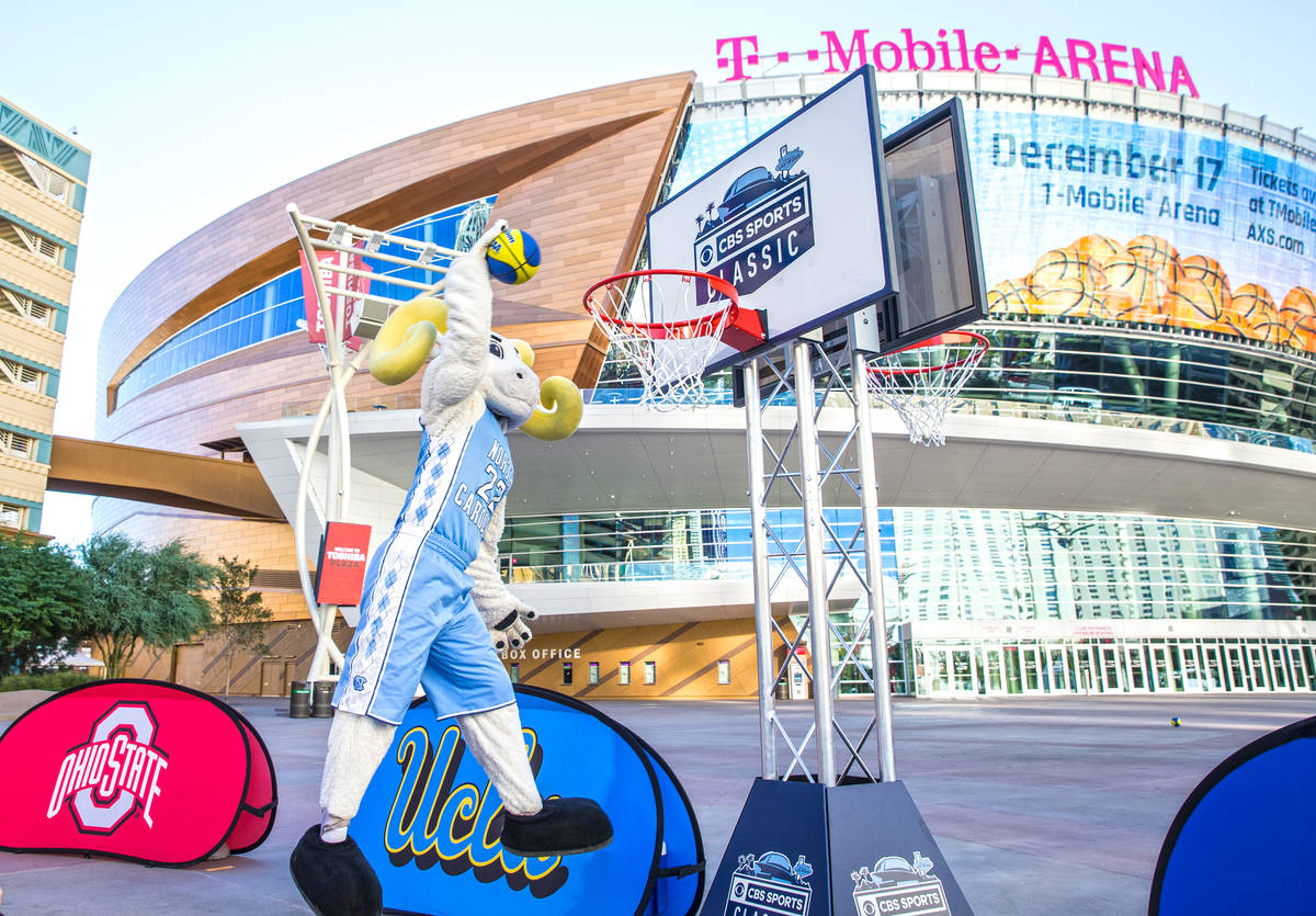 North Carolina mascot Rameses goes up for a dunk on Tuesday, Oct. 11, 2016, outside T-Mobile Ar ...