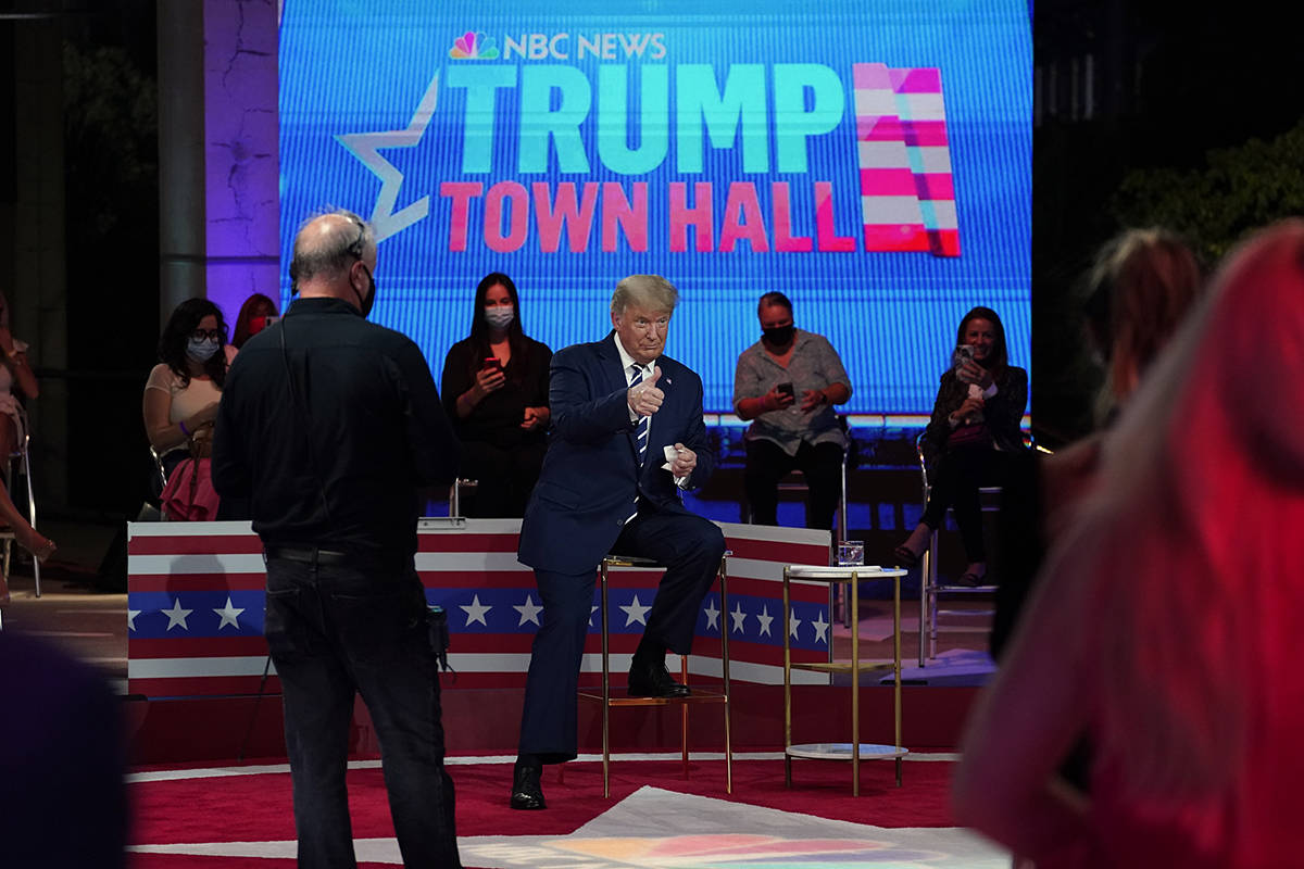 President Donald Trump gives a thumbs up during a break in an NBC News Town Hall, at Perez Art ...