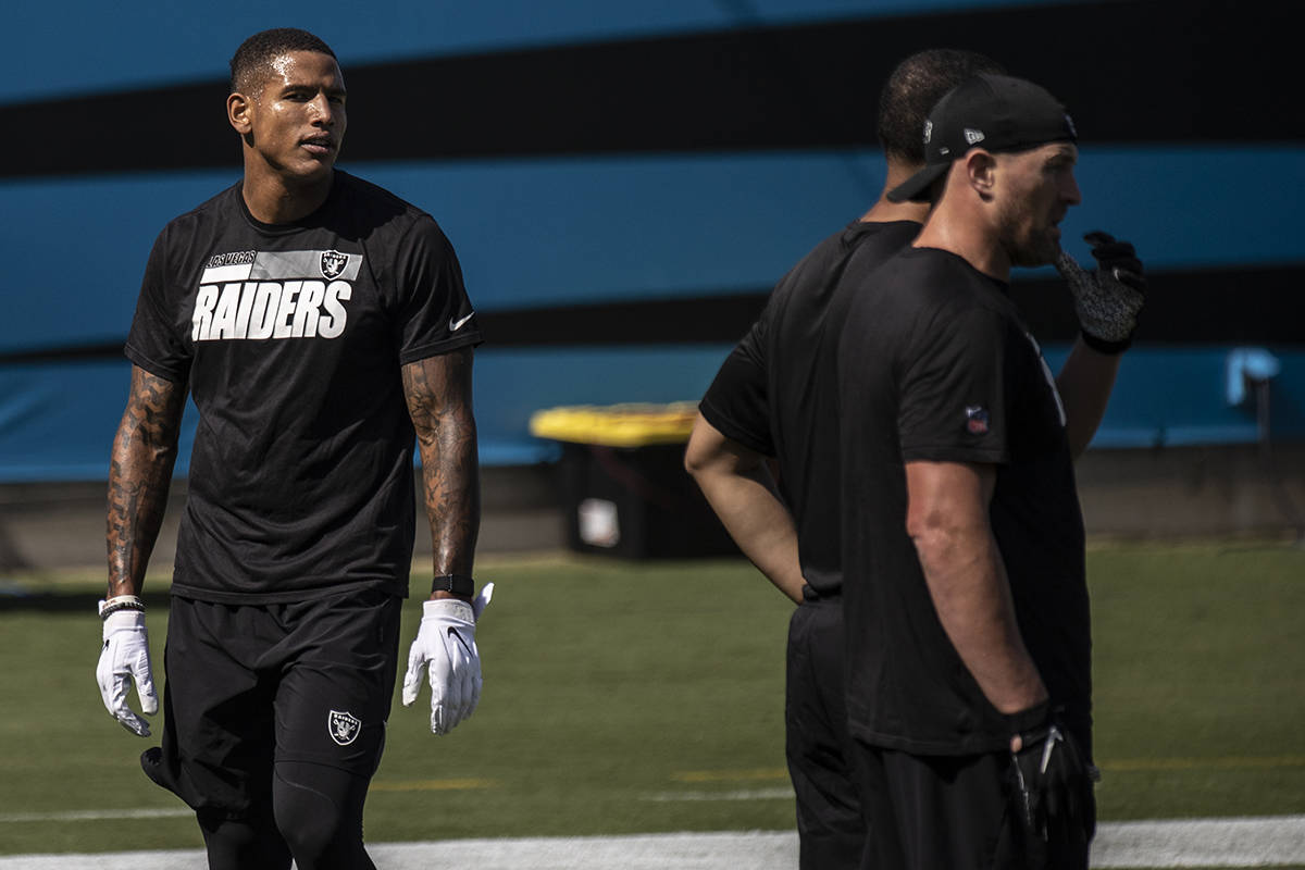 Las Vegas Raiders tight end Darren Waller (83) warms up before the start of their NFL football ...