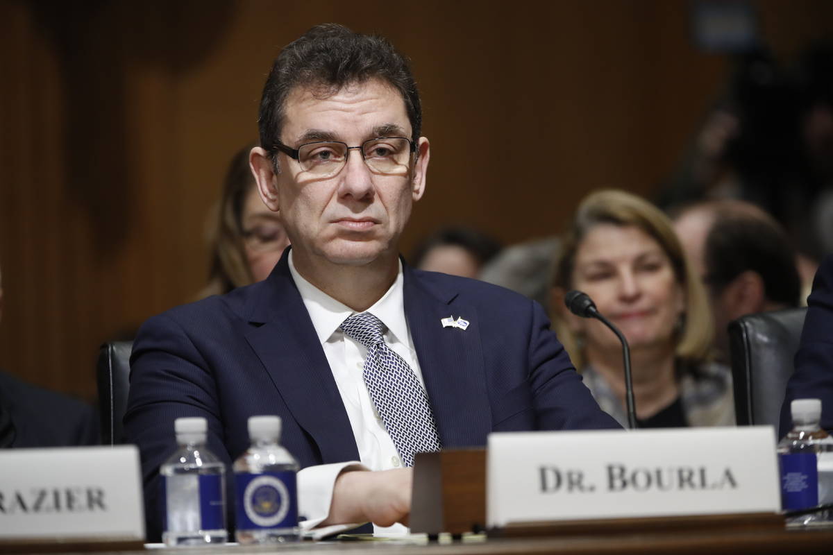 In a Feb. 26, 2019, file photo, Albert Bourla, chief executive officer of Pfizer, prepares to t ...