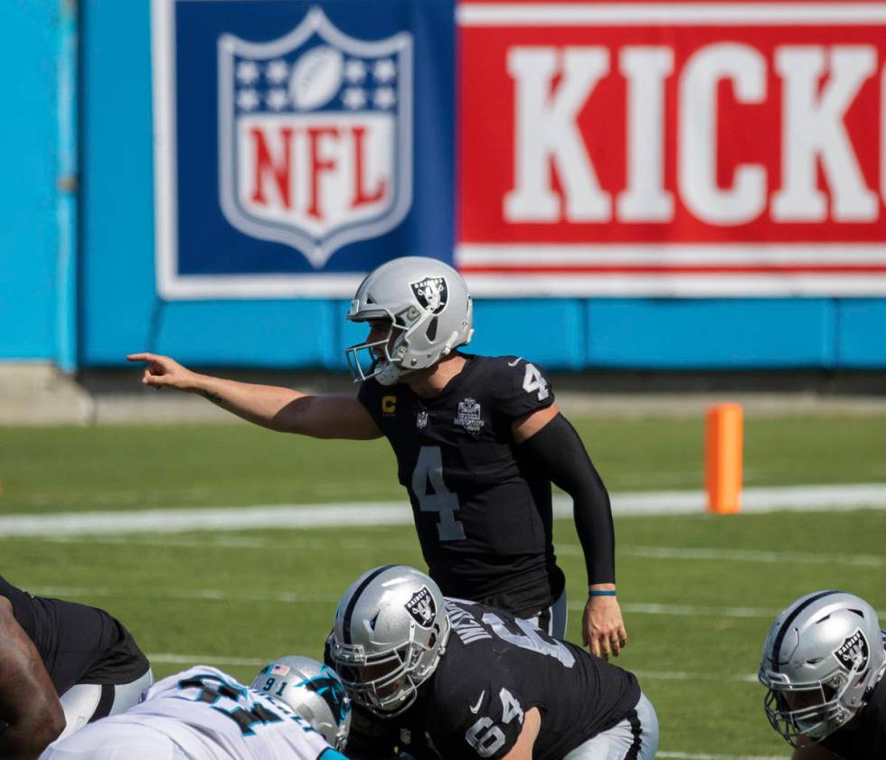 Las Vegas Raiders quarterback Derek Carr (4) calls an audible during the second half of an NFL ...