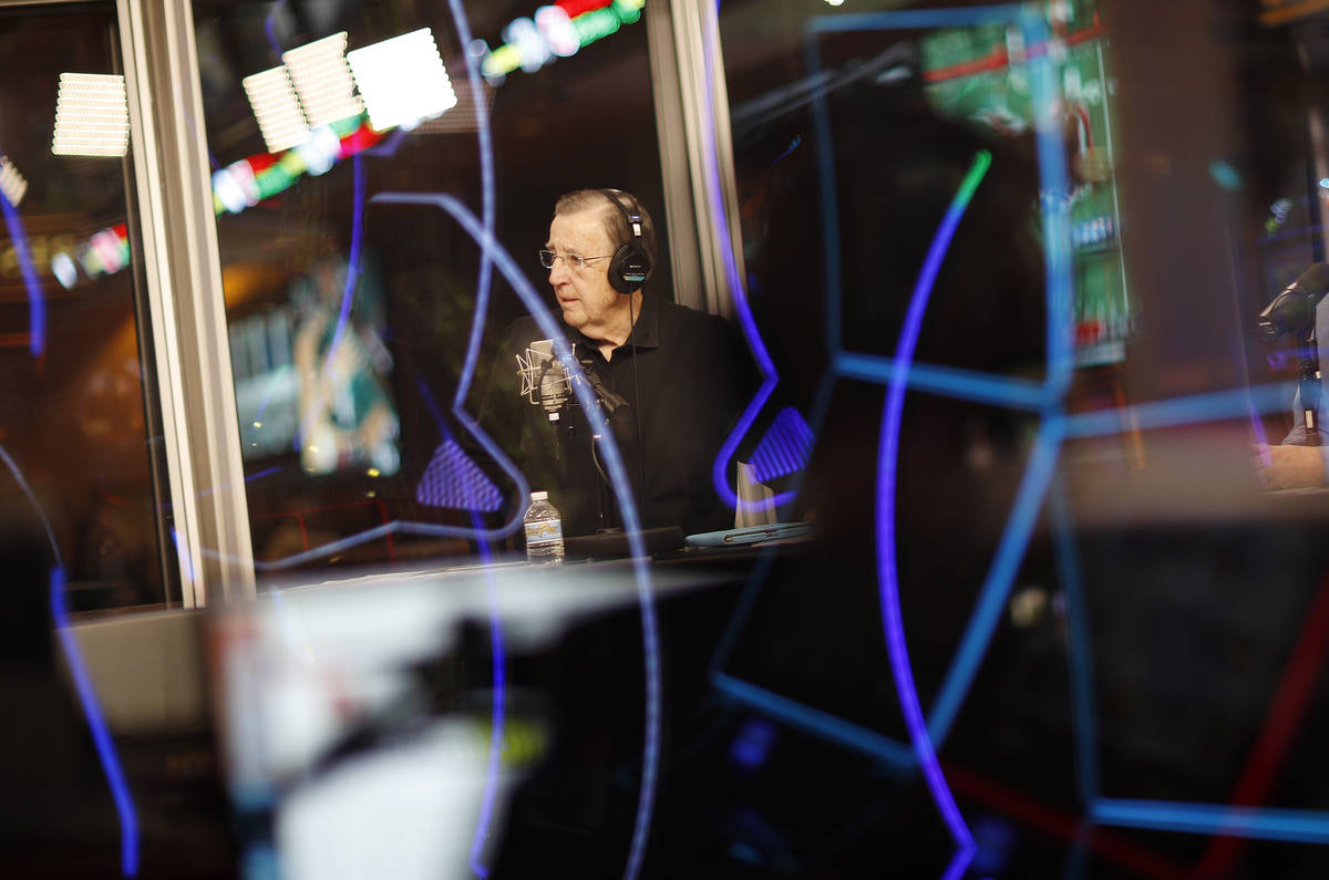 In this Nov. 16, 2017, photo, Brent Musburger broadcasts a show from a glass booth at the South ...