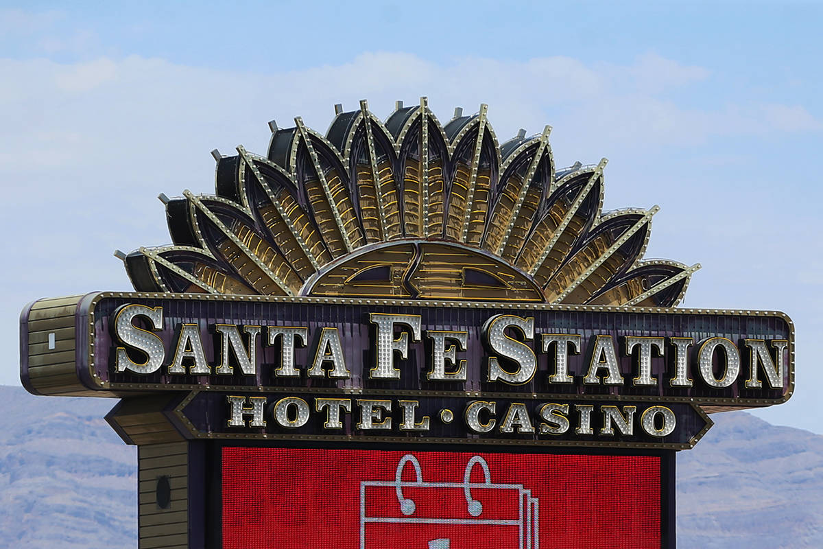 A marquee announces the reopening at Santa Fe Station hotel-casino in Las Vegas, Wednesday, Jun ...