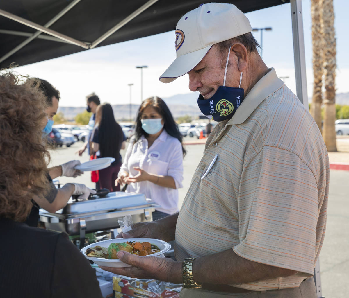 Arturo Cota, 75, of Las Vegas, eats a free meal provided at the Desert Breeze Community Center ...