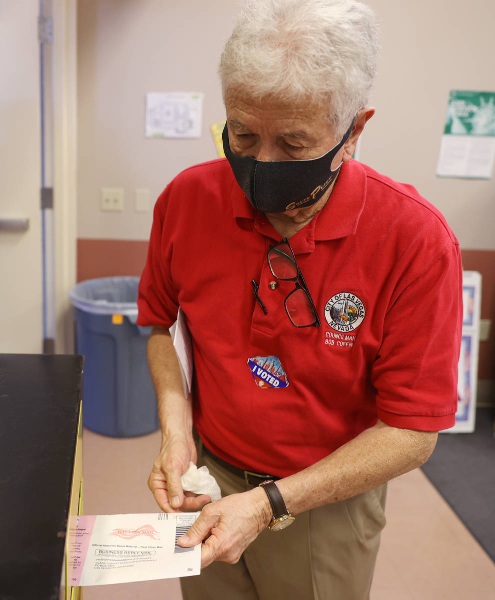 Former Councilman Bob Coffin drops off his ballot at the East Las Vegas Community Center pollin ...