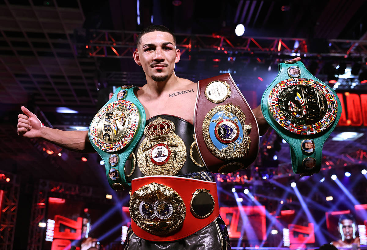 Teofimo Lopez celebrates after winning a unanimous decision over Vasiliy Lomachenko in their li ...