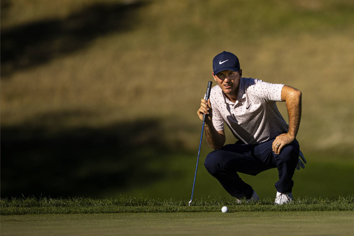 Russell Henley lines up a putt on the 13th green during the third round of the CJ Cup at the Sh ...