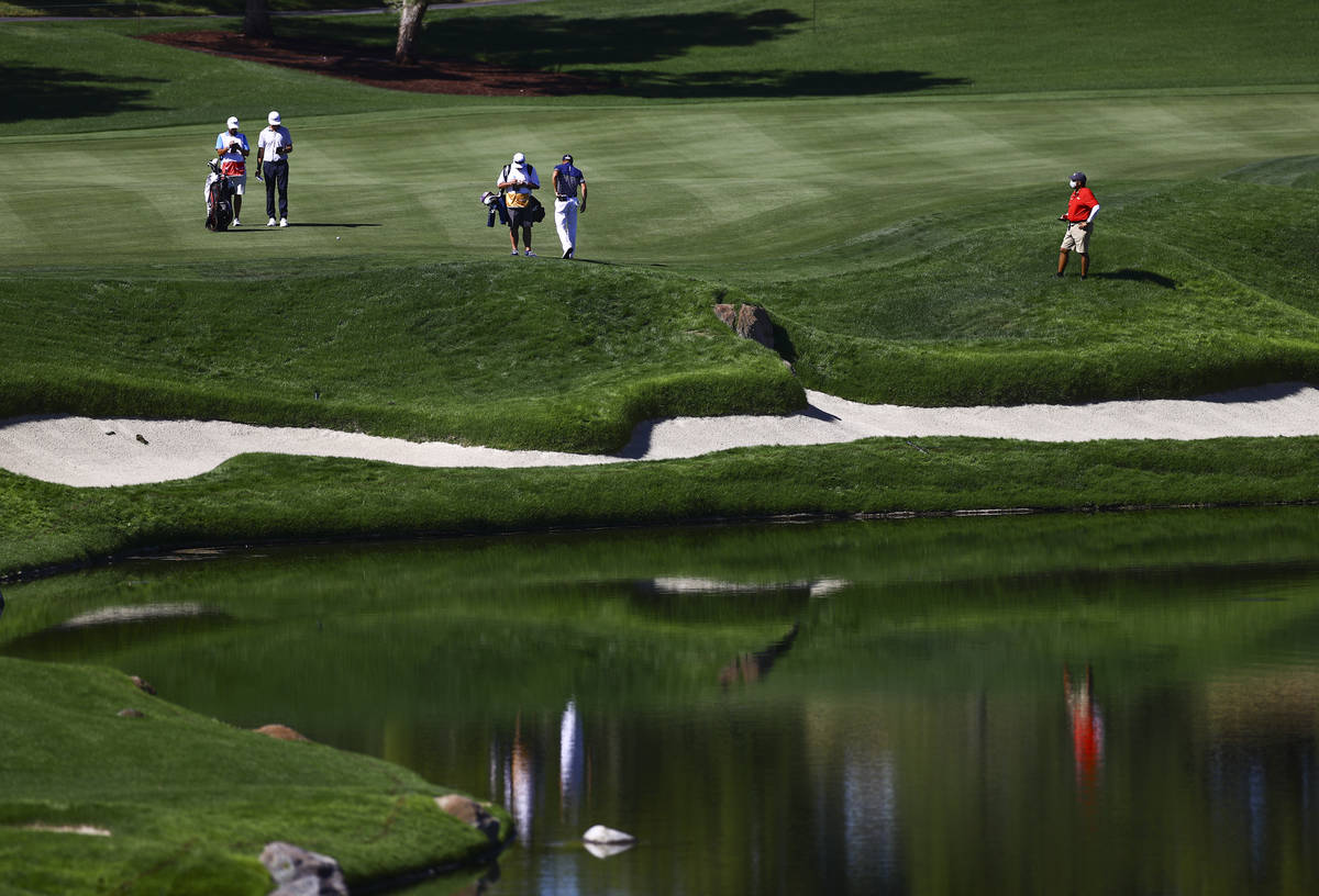 Golf players wait to head to the fourth green during the third round of the CJ Cup at the Shado ...