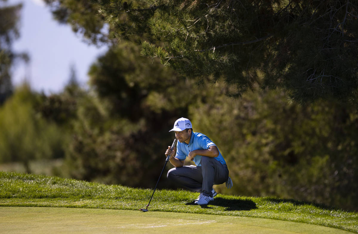 Xander Schauffele lines up a putt on the fifth green during the third round of the CJ Cup at th ...