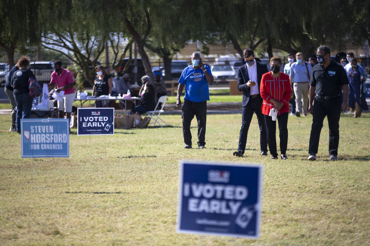 Rep. Karen Bass, D-Cal., right, walks into the Souls for the Polls event at Kianga Isoke Palaci ...