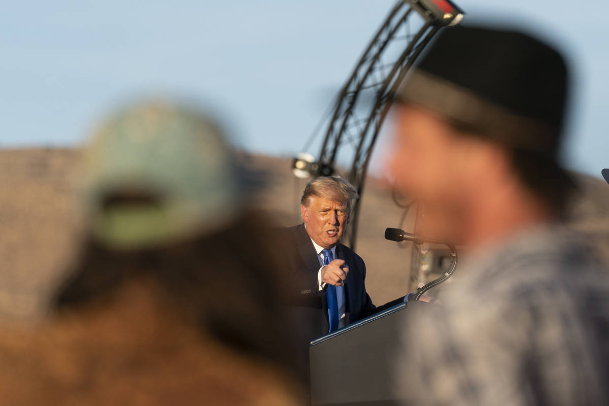 President Donald Trump speaks at a campaign rally at Carson City Airport, Sunday, Oct. 18, 2020 ...