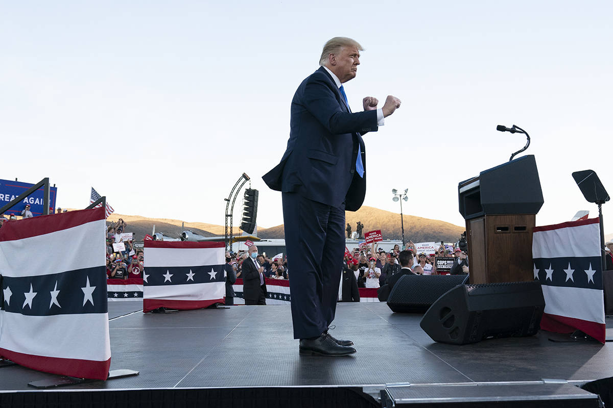 President Donald Trump dances after speaking at a campaign rally at Carson City Airport, Sunday ...