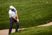 Jason Kokrak chips onto the seventh green during the final round of the CJ Cup at the Shadow Cr ...