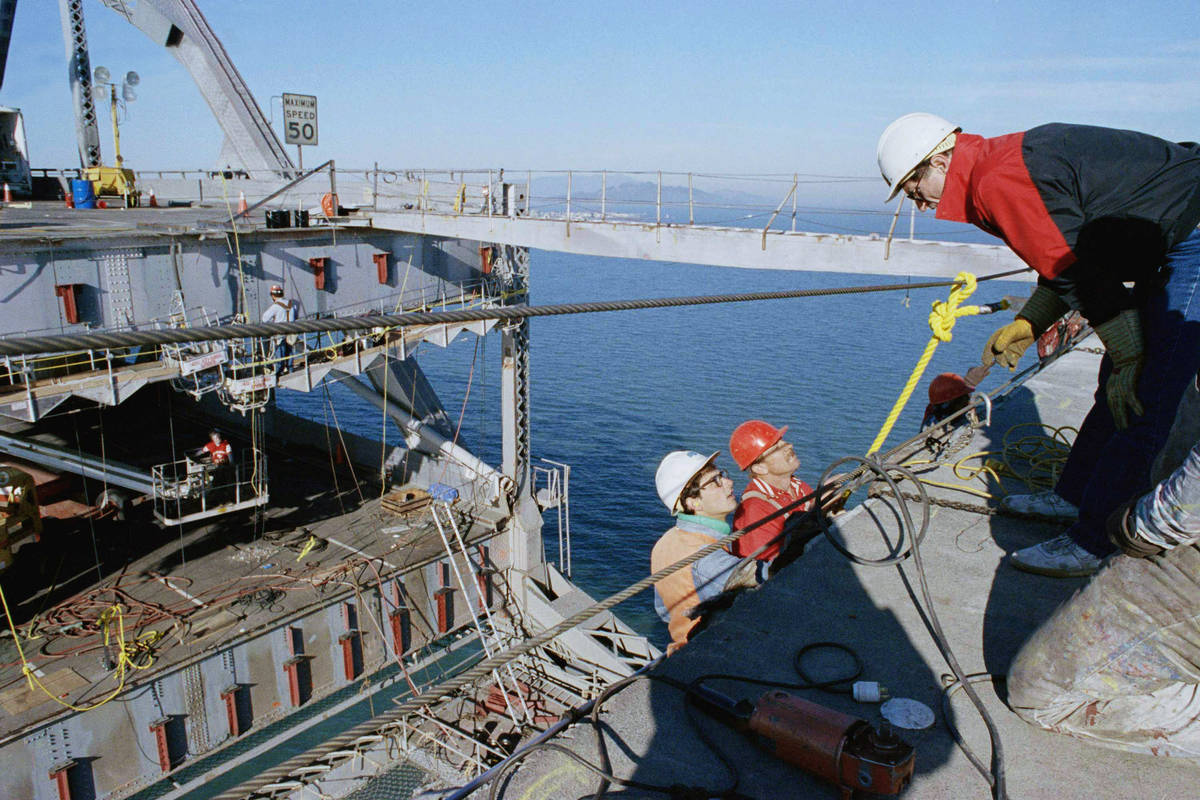 Jim Vallas, Cal Trans residents engineer, right, discusses progress of repair on the San Franci ...