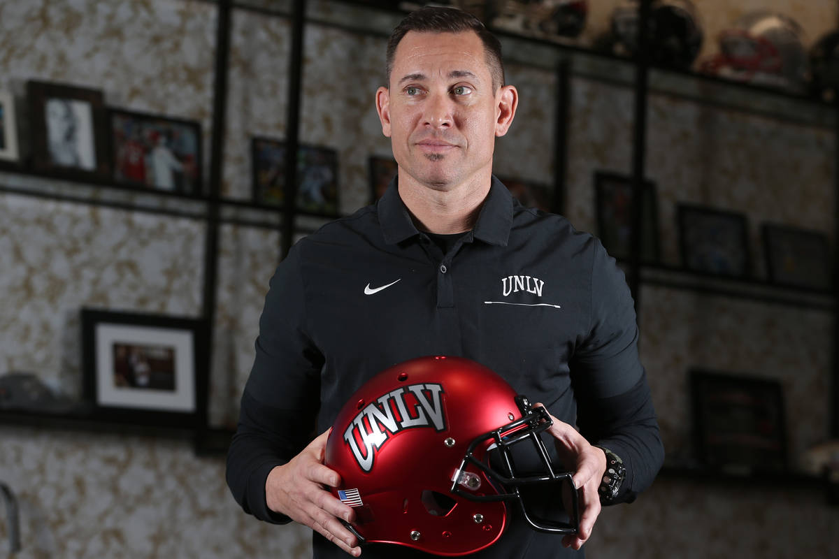 UNLV football head coach Marcus Arroyo is photographed in his office at the Fertitta Football C ...