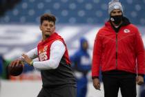 Kansas City Chiefs quarterback Patrick Mahomes (15) warms up before an NFL football game agains ...