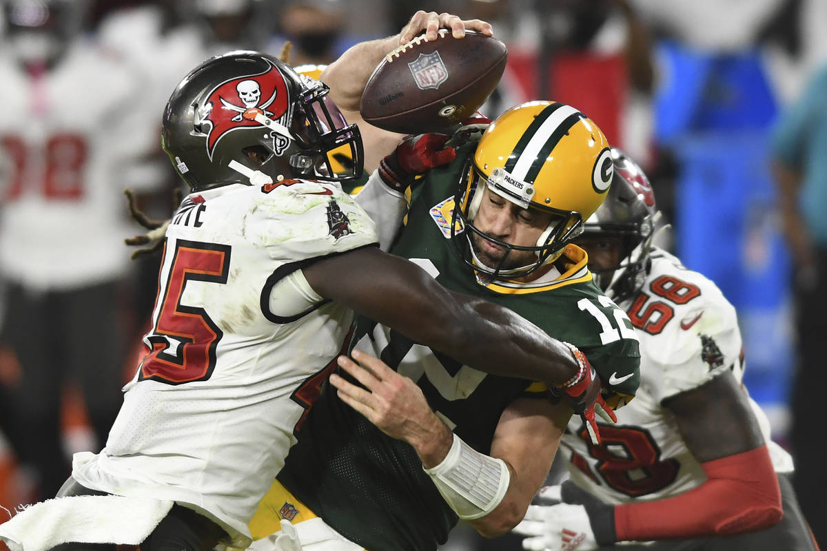 Tampa Bay Buccaneers inside linebacker Devin White (45) sacks Green Bay Packers quarterback Aar ...