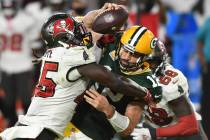 Tampa Bay Buccaneers inside linebacker Devin White (45) sacks Green Bay Packers quarterback Aar ...
