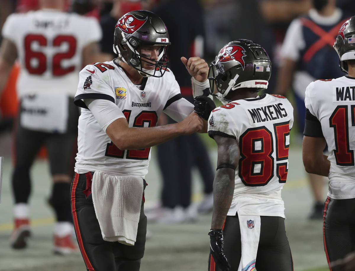 Tampa Bay Buccaneers quarterback Tom Brady (12) celebrates with wide receiver Jaydon Mickens (8 ...