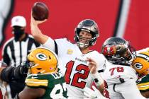 Tampa Bay Buccaneers quarterback Tom Brady (12) throws a pass against the Green Bay Packers dur ...