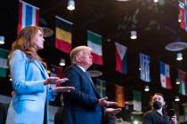 President Donald Trump closes his eyes as he accepts blessings as he attends church at Internat ...