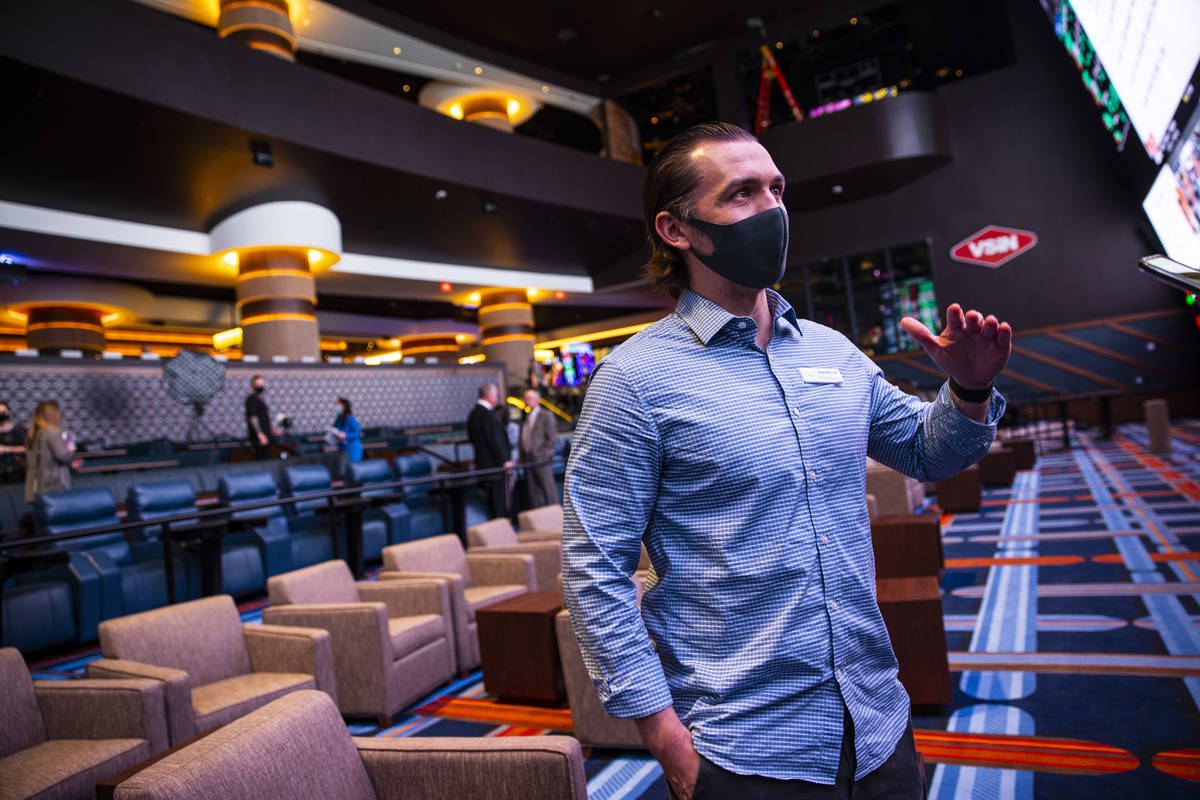 Matt Metcalf, director of the Circa Sportsbook, talks about sports betting during a tour of Cir ...