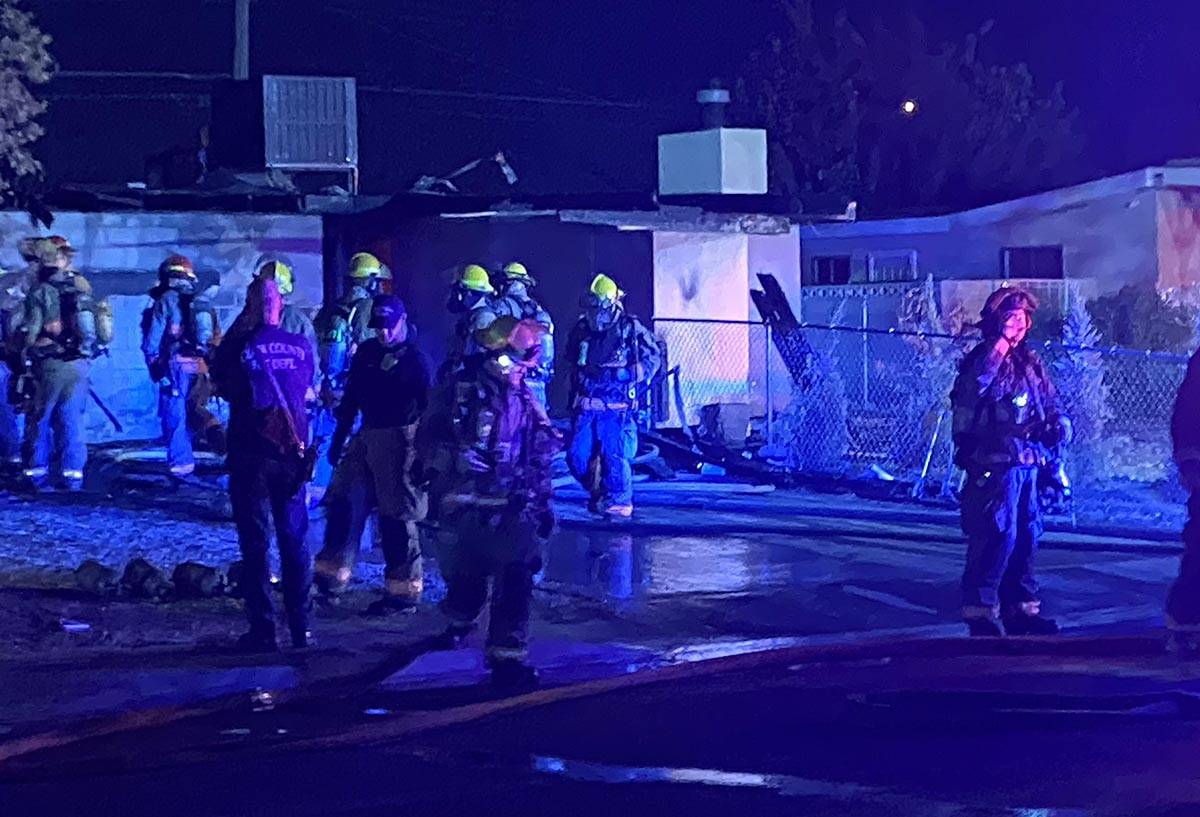Clark County firefighters at the scene of a fire on the 5000 block of East Sun Valley Drive on ...