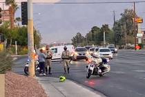 Police at the scene of a motorcycle crash at North Decatur Boulevard and West Craig Road on Wed ...