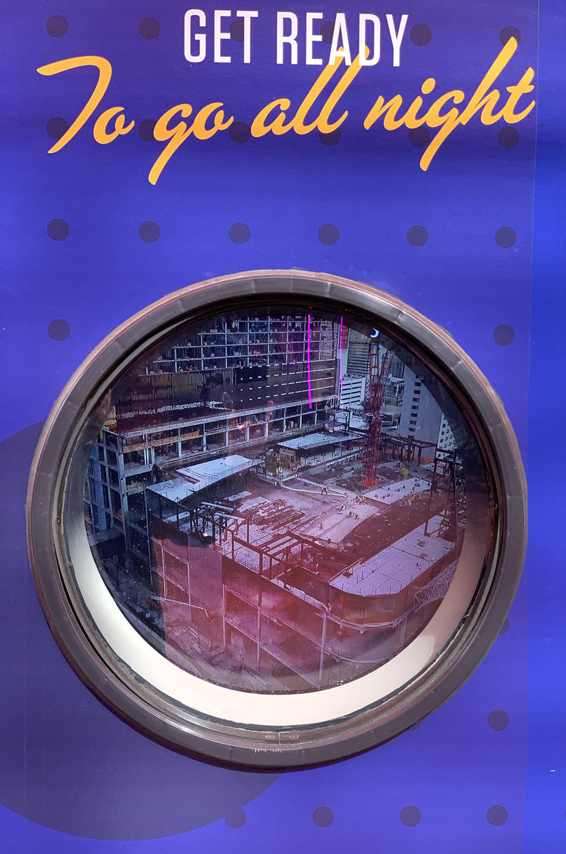 A porthole outside Circa, the new hotel-casino by owners Derek and Greg Stevens, displays a vid ...