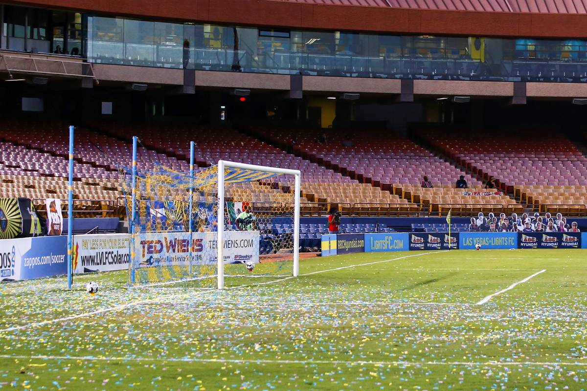 Cardboard cutouts of fans are seen, right, during the first half of a USL soccer game against R ...