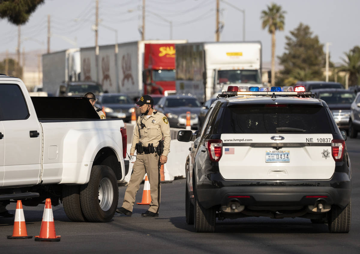 The LVMPD investigate a barricade situation involving a man not allowing a female and child to ...